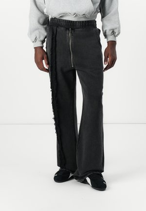 LOGO PANTS UNISEX - Treniņtērpa apakšdaļas - black