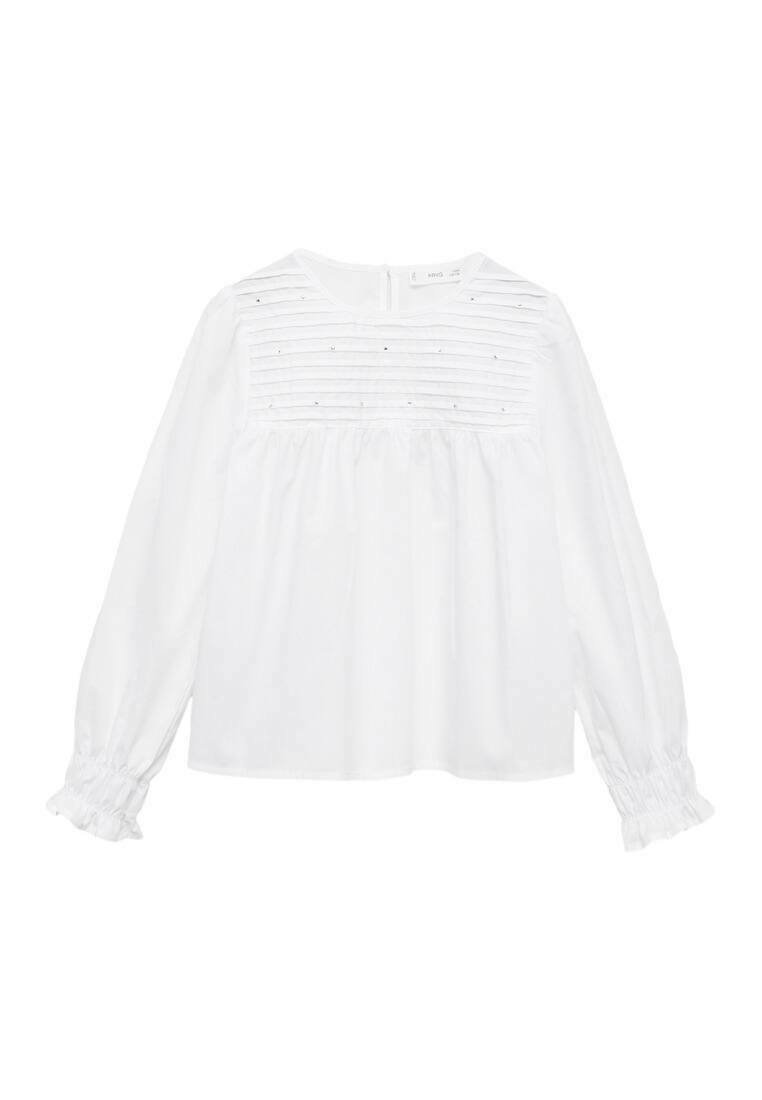 Blusa bianca con maniche lunghe, strisce verticali testurizzate sul giromanica, vita arricciata e polsini elasticizzati. Chiusura a chiave sulla schiena.