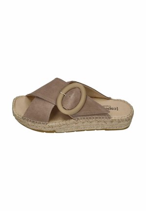 Beige suede slip-on sandal with wide cross straps, large oval buckle, and woven platform sole.