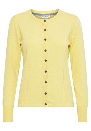 Kollane kardigan, mis on valmistatud pehmest kangast, pika varrukaga, nööbiga ees sulgemisega ja külgseamete ülesehitusega. Omab tumedaid nuppe ja ümara kaeluse kujundust.