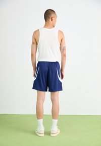 adidas Originals ARCHIVE - Teplákové kalhoty - dark blue/white