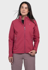 Damen Softshell-Jacke in Tiefrosa, mit durchgehendem Reißverschluss, hohem Kragen, Reißverschluss-Taschen und schlankem Design aus dehnbarem Material.
