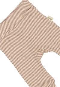Leggings a rayas en color crema y rosa suave, confeccionados en una tela de canalé con una textura suave; cuentan con un diseño ajustado y una etiqueta con el logotipo.