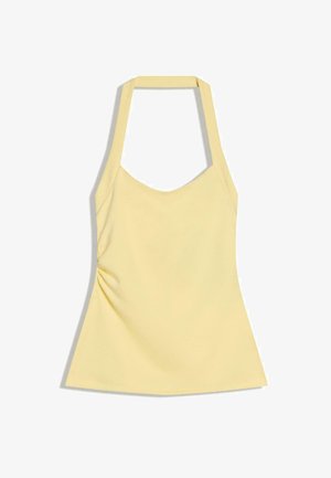 Pale yellow halter top with a fitted waist and slight ruching on the left side, displayed flat on a white background.