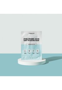 Hyaluronsyre dybdefugtmaske i en sølv- og lyseblå pose med ikoner for hydrering, ingredienser og påføringstid.