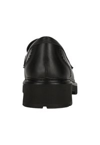 Scarpa di pelle nera con retro arrotondato, cuciture visibili e suola in gomma spessa e textured. Presenta una finitura liscia e dettagli scallop.