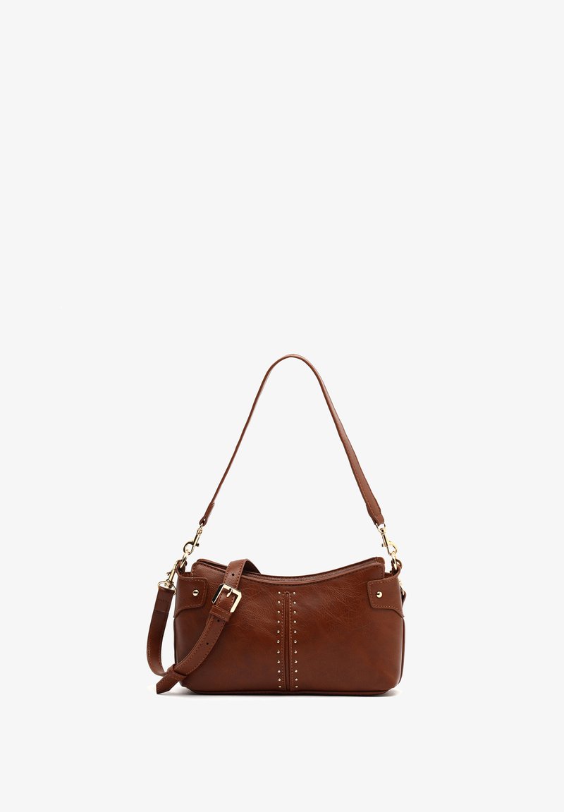 Brown leather crossbody bag with a curved shape, studded detailing, gold hardware, and an adjustable strap. Smooth texture and soft finish.