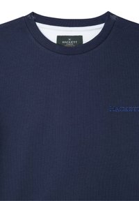 Marineblå bomulds T-shirt med rund halsudskæring, prydet med et lille broderet "HACKETT" logo på venstre side. Struktureret stof, uden mønstre.