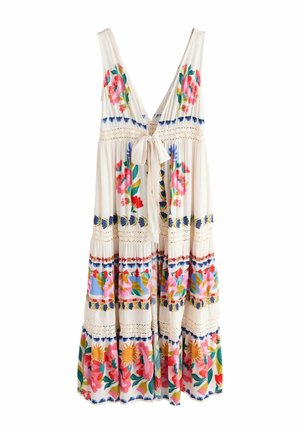 Varrukateta kreemjas kleit sügava V-kaelusega, esikinnis lipsuga ning roosade, siniste ja kollaste lillemustritega, astmelisel seelikupalil.