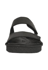 Svarta slidesandaler med två justerbara remmar, en strukturerad fotbädd och en tjock gummisula. Slät övre material.