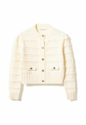 Pleteni kardigan u krem boji s rebrastom teksturom, okruglim izrezom i zatvaranjem na prednje gumbe. Ima dva ukrasna džepa s metalnim detaljima.