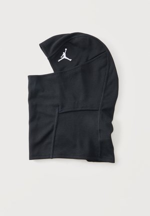 Черна балаклава с бяло лого Jumpman отгоре, изработена от ребрист плат, показана плоска на светъл фон.