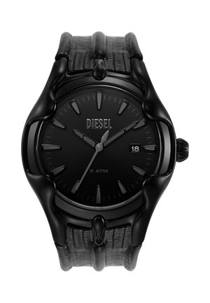 Black Diesel wristwatch with textured strap, analog display, date window at 3 o'clock, and 5 ATM water resistance marking.