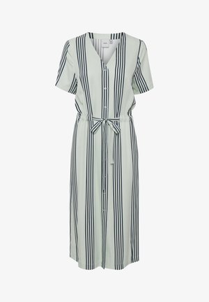 Šviesiai žalia, trumpomis rankovėmis suknelė su tamsiai mėlynomis vertikaliomis juostelėmis. Yra V formos iškirptė ir surišamas juosmuo pritaikytam tinkamumui. Minkšta audinio tekstūra.