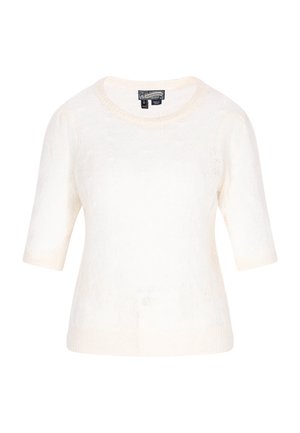 Krems tonis īsām piedurknēm adīta džempera, ar apaļu kakla izgriezumu un nedaudz brīvu piegriezumu ap ķermeni.