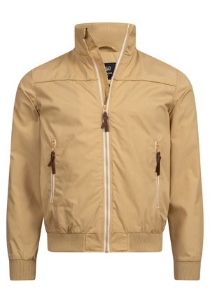 Giacca bomber color cachi realizzata in tessuto liscio, dotata di colletto alto, polsini a costine, due tasche con zip e dettagli in zip bianco a contrasto.