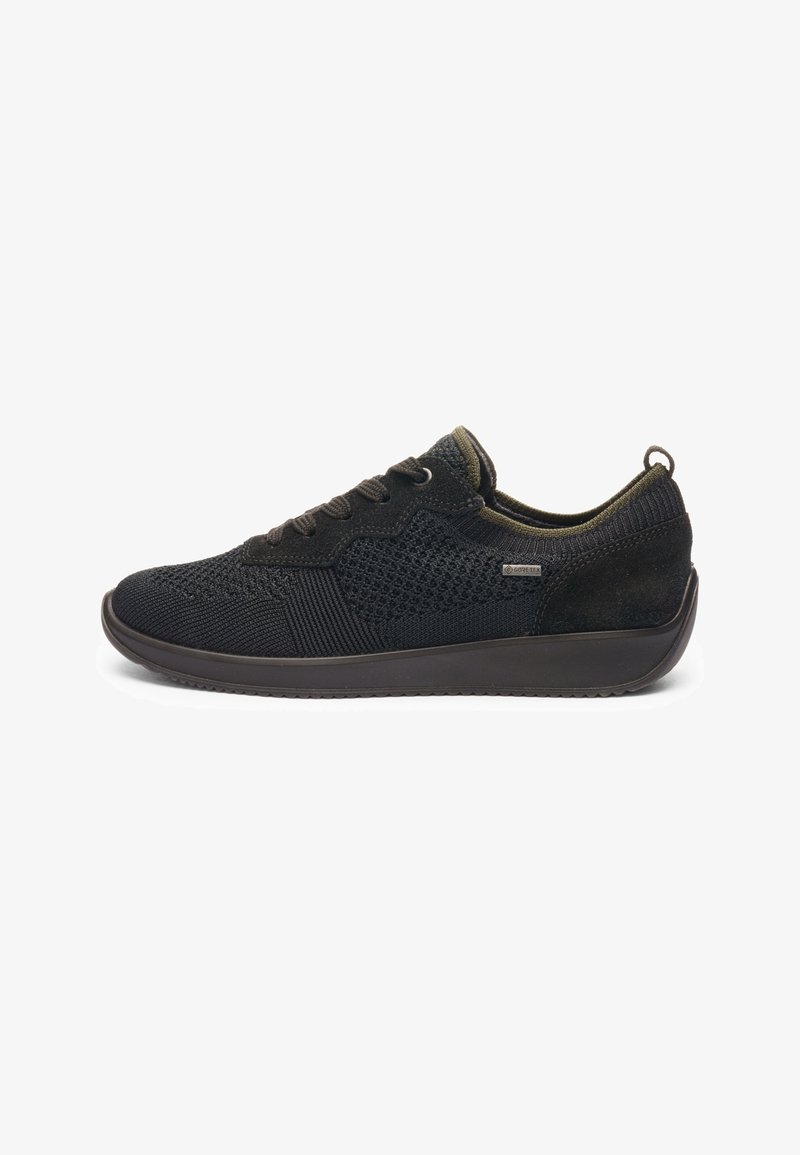 Black low-top sneaker with knit fabric, lace-up closure, Gore-Tex tag on side, cushioned sole, and pull tab at heel.