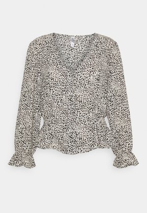 Long-sleeve blouse in lightweight fabric, featuring a black and beige leopard print, v-neck, and ruffled cuffs with a peplum hem.