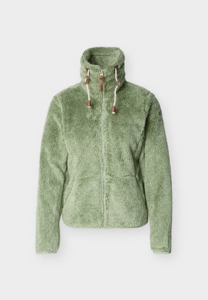 Jachetă fleece verde deschis, cu fermoar complet și guler înalt, dotată cu șnururi albe și accente din piele maro, pe un fundal simplu.