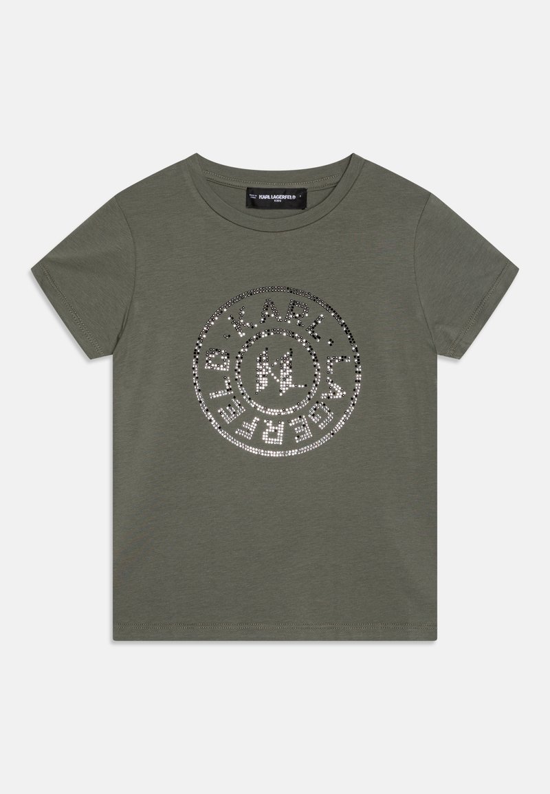 Olivgrön bomullströja med rund logotypdesign prydd med silverfärgade strass. Rund halsringning och korta ärmar, slät yta.