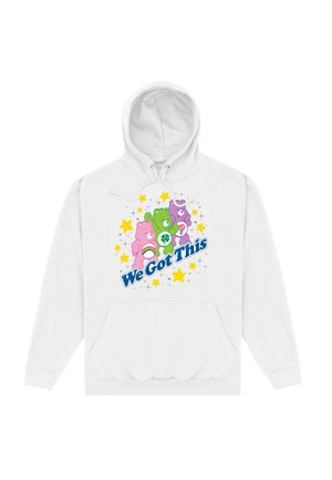 Hvid hættejakke med et frontmotiv af farverige bjørne og teksten "Vi har styr på det" omgivet af stjerner og glimmer.