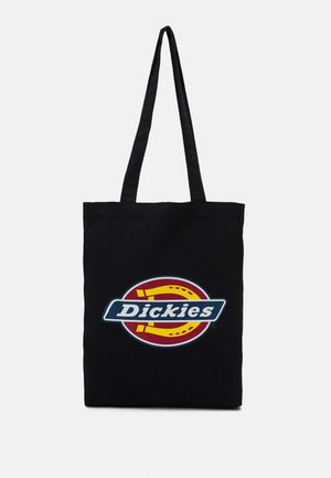 Borsa tote nera in cotone con manici lunghi, caratterizzata da un logo circolare multicolore con la scritta "Dickies" in bianco al centro.