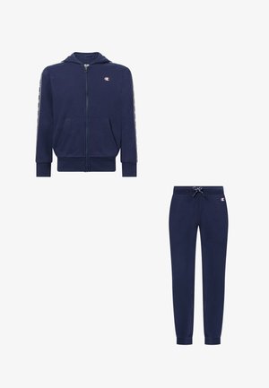 Marineblauwe zip-up hoodie met zakken aan de voorkant en bijpassende joggerbroek met trekkoord in de taille, beide met klein Champion-logo.
