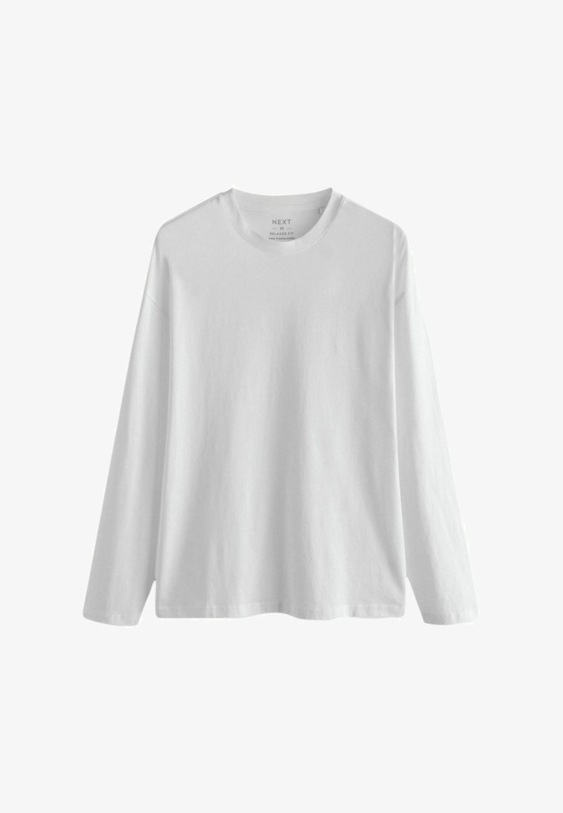 Pikkade varrukatega valge puuvillane t-särk ümmarguse kaelusega ja vabalt istuv. Sile tekstuur, ilma mustrite või aktsendita. Sildid nähtavad krae sees.