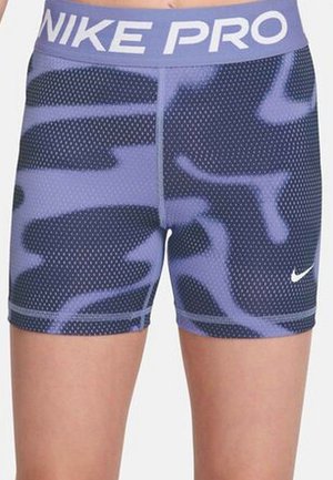 Pantalones cortos de compresión Nike Pro con patrón de camuflaje azul y negro y logotipos blancos de Nike en la cintura y la parte inferior de la pierna izquierda.