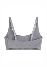 Grå bralette med justerbare stropper, glat stof og et minimalistisk design. Har et blødt bånd og enkle syindstillinger.
