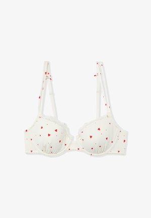 Reggiseno bianco con stampe a cuori rossi, tessuto texturizzato, bordo in pizzo e spalline regolabili; design con ferretto e chiusura a gancio sul retro.