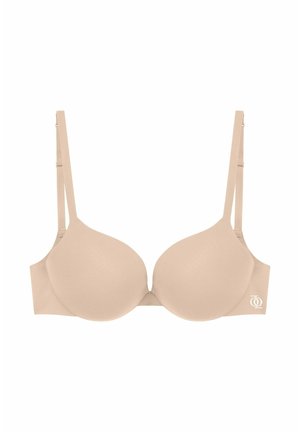 Beige padded underwire bra with adjustable straps and a small white logo on the left side band.