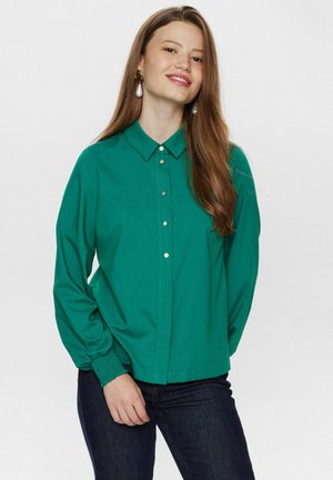 Green button-up blouse with a collar, long sleeves, and gathered cuffs. Features a smooth texture and a straight cut design.