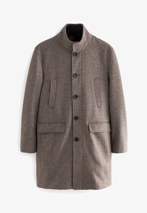 Hnědý kabát v herringbone vzoru s vysokým límcem, šesti knoflíky a dvěma předními kapsami. Vyrobený z texturované látky, s žebrovaným vnitřním límcem.