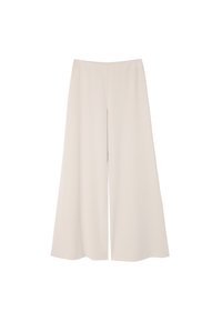 Pantalons large, de couleur crème avec une texture lisse et une ceinture élastique, présentant un design épuré et minimaliste sans fermetures apparentes.