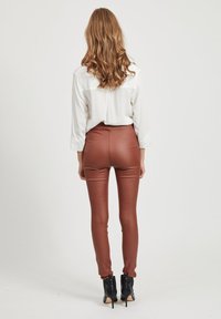 Object OBJBELLE COATED - Leggings - Trousers - brown patina
