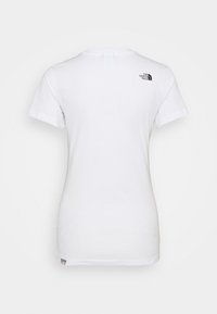 Vit bomull t-shirt med korta ärmar, med en liten svart logotyp på den övre delen av ryggen. Klassisk rundhalsdesign, mjuk yta.