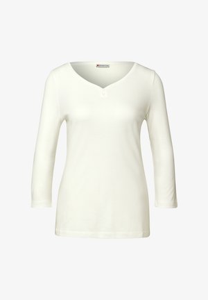 Biała bluzka z długim rękawem, z dekoltem w kształcie litery V i z trzema guzikami. Gładka tekstura i dopasowany krój, wykonana z miękkiego elastycznego materiału.