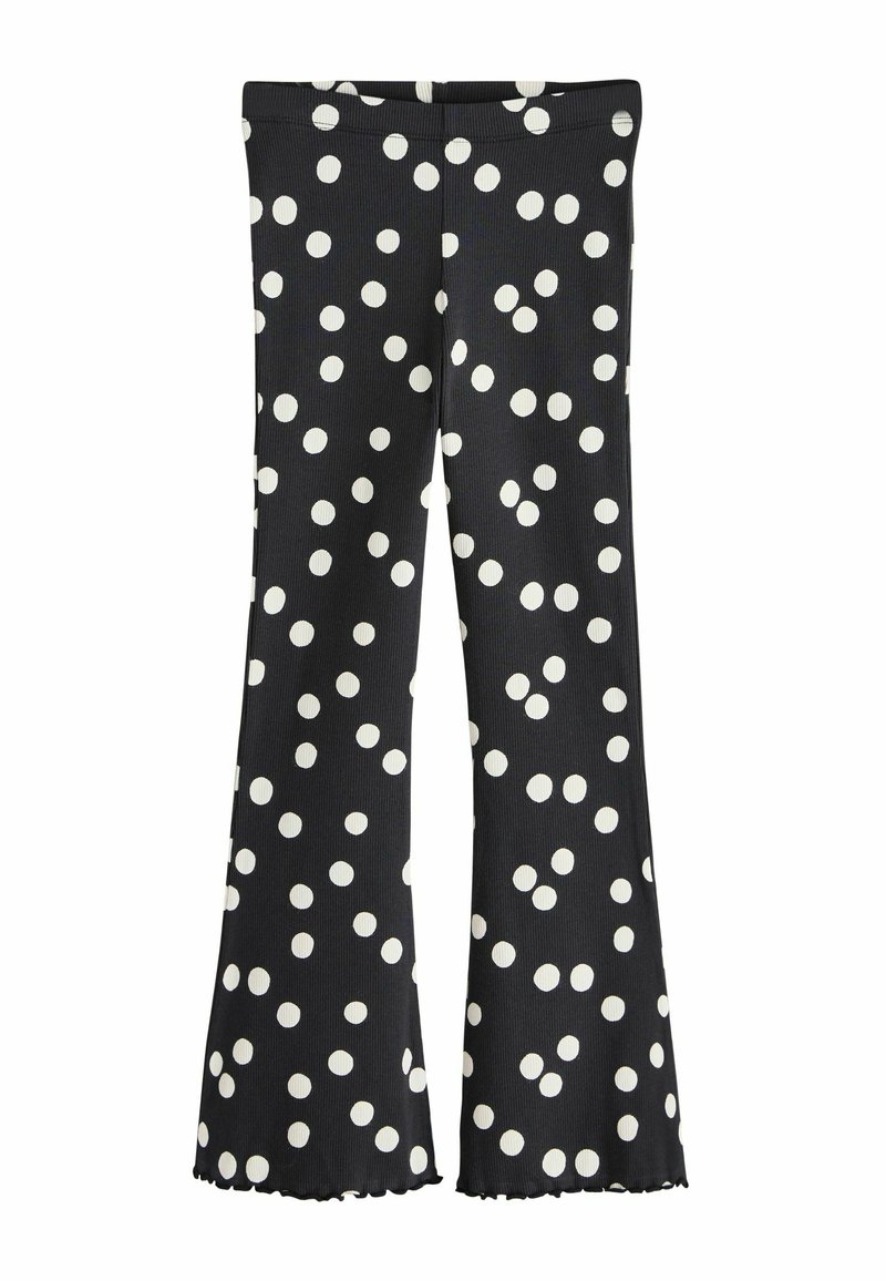 Zwarte uitlopende broek met witte polka dots, met een geribbelde textuur en een ruwe zoom aan de onderkant. Elastische tailleband voor comfort.