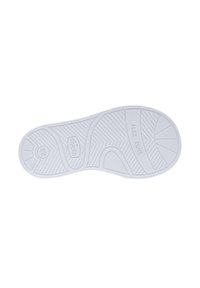 Semelle de chaussure en caoutchouc blanc avec des motifs de grip texturé, y compris une "ZONE FLEX" et un logo. Présente une surface lisse et une forme arrondie.