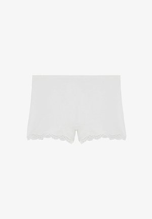 Pantaloni shorts bianchi in cotone con orlo in pizzo scallopato, texture morbida e design semplice. Adatti per un comfort quotidiano.