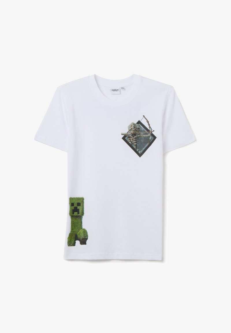 T-shirt bianco in cotone con una grafica di un arciere scheletro all'interno di una forma romboidale e un personaggio Creeper verde in basso a sinistra.
