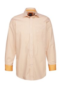 Helles orange Hemd mit Knöpfen und geometrischem Muster, mit kontrastierenden dunkelorangen Manschetten und einer kleinen Brusttasche. Stoff aus Baumwollmischung.