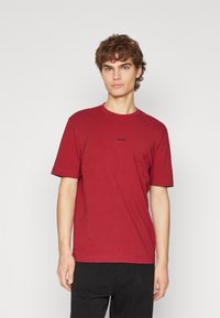BOSS TCHUP - T-shirts - open red