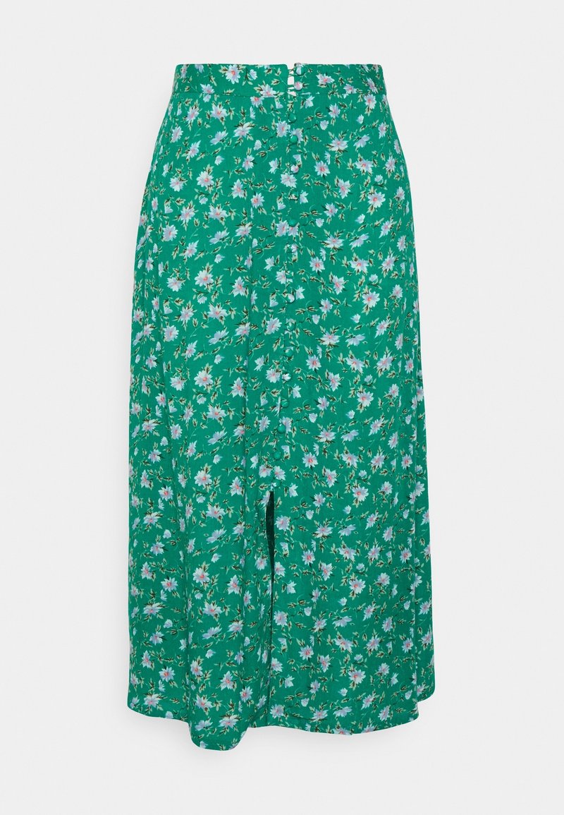 Vihreä kukallinen hame, jossa on napitus edessä. Ominaisuuksia ovat pienet vaaleanpunaiset ja valkoiset kukat vihreässä lehtikuviossa. Kevyt kangas, polvipituinen malli.