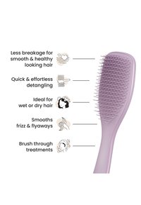 Brosse démêlante violette avec texte énumérant les avantages : moins de casse, démêlage rapide, idéale pour cheveux mouillés/secs, lisse les frisottis, et fonctionne avec les traitements.