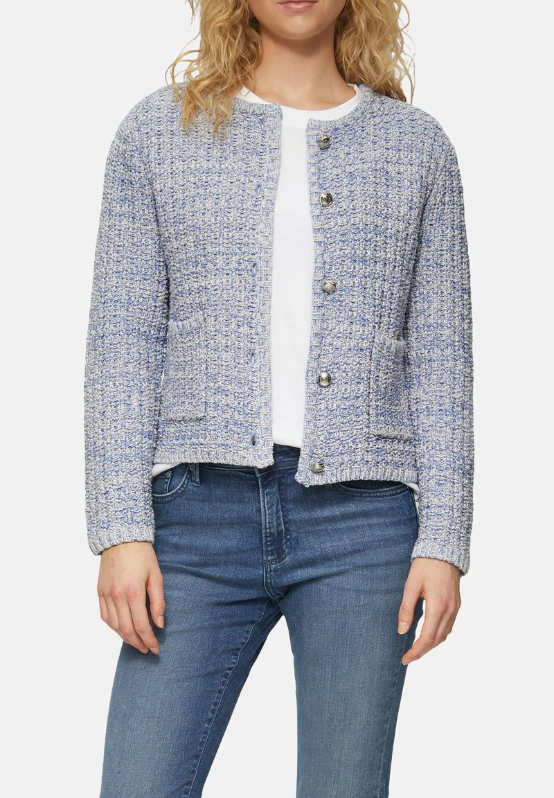 Blau-weiße Tweed-Jacke mit rundem Halsauschnitt, Knopfverschluss und zwei Fronttaschen. Rippbündchen und Saum aus strukturiertem Stoff.