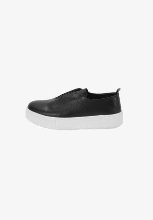 Chaussures en cuir noir à enfiler avec un dessus texturé, semelle épaisse blanche et tirette à l'arrière. Design bas pour un enfilage facile.