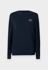 Navy blue long-sleeve sweatshirt with ribbed cuffs and hem, featuring small Tommy Jeans New York logo and flag on left chest.