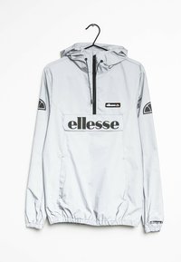Ljust grå Ellesse huva vindjacka med halv-zip, framficka med klaff, elastiska ärmslut och svarta logotryck på bröstet och ärmarna.
